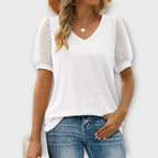 TOP CON CUELLO ALTO EN V Y MANGAS TRANSPARENTES