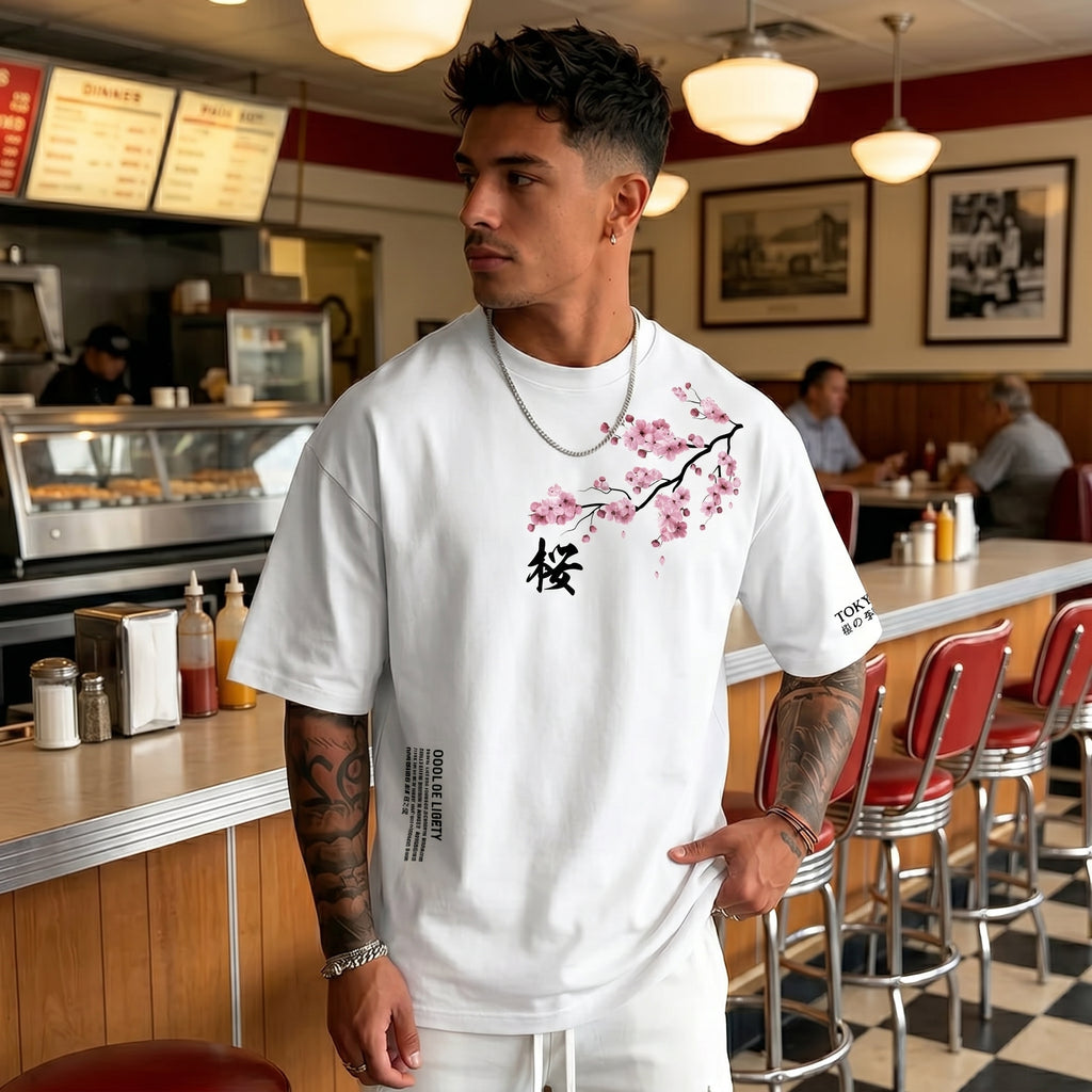 Camiseta urbana para hombre de corte holgado – algodón 100% premium, ajuste oversize casual y estampado japonés de flor de cerezo