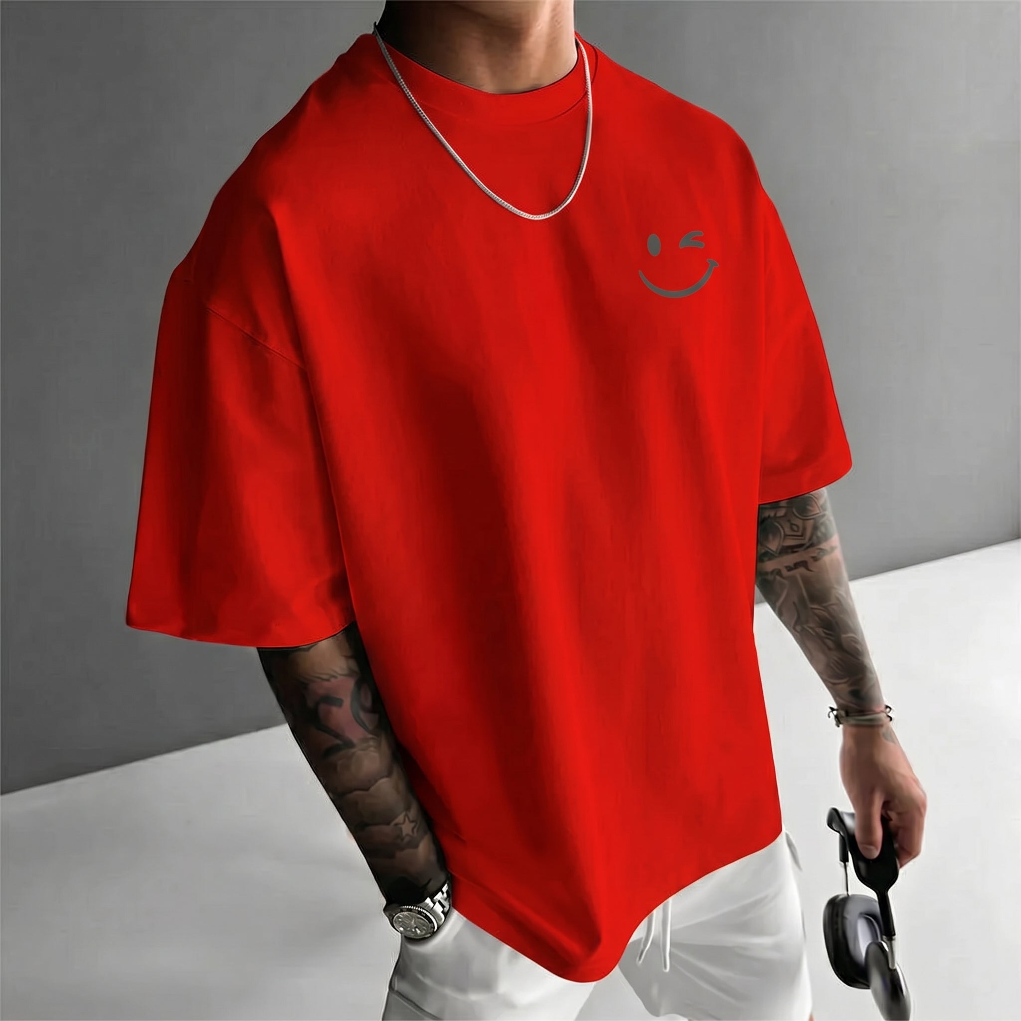 Camiseta urbana para hombre de corte holgado – algodón 100% premium, ajuste oversize casual y estampado tipográfico.
