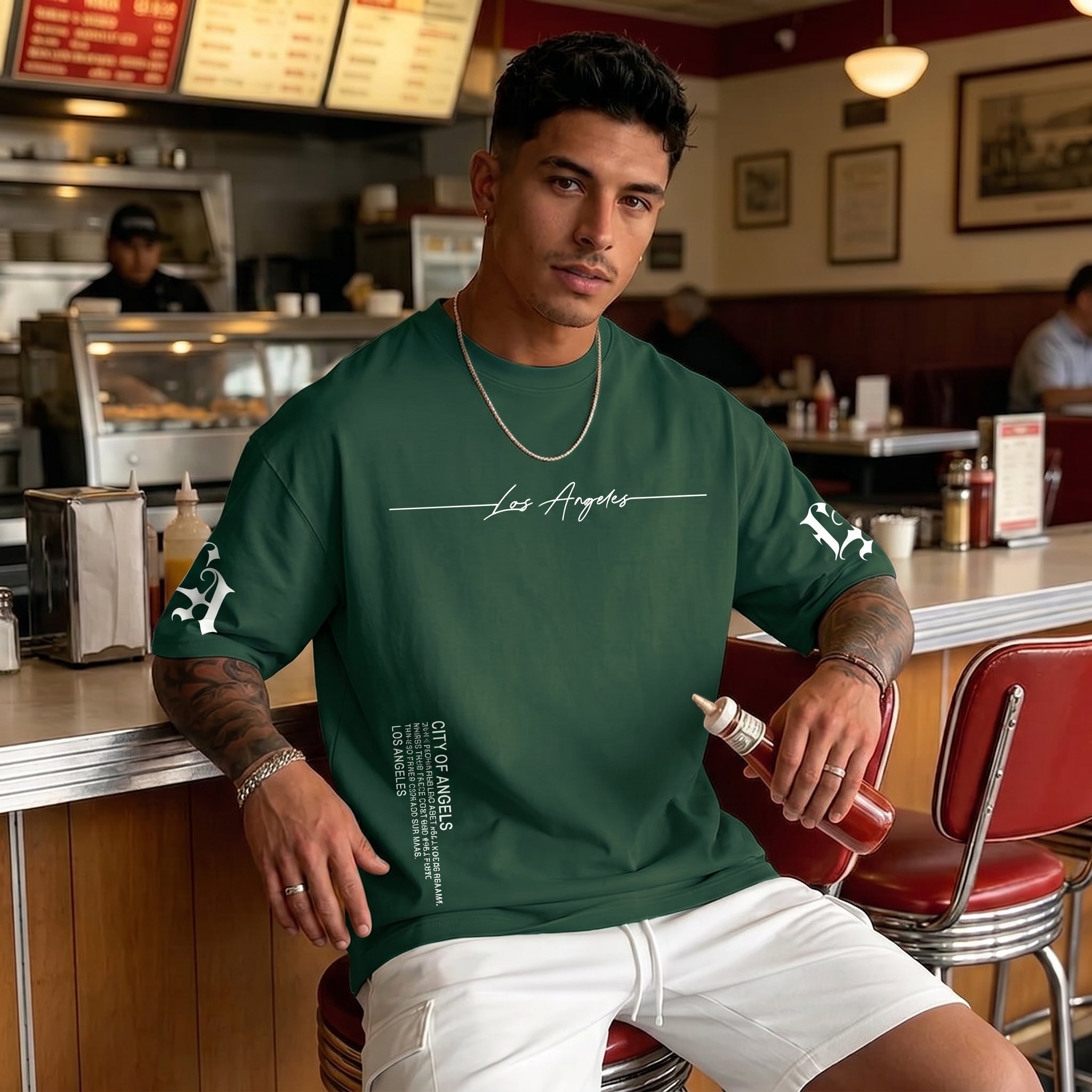 Camiseta urbana para hombre de corte holgado – tejido ligero y transpirable, ajuste oversize casual y estampado tipográfico de letras