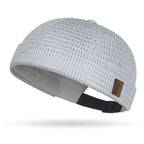 Gorra ligera de malla transpirable, sin visera.
